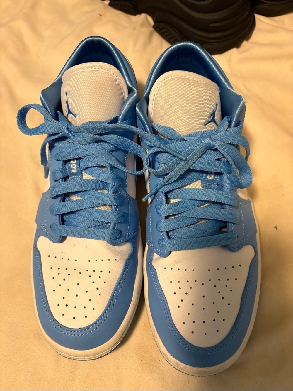 Jordan Low-Top Sneakers in University Blue and White- Blue Air Jordan 1 Low UNC